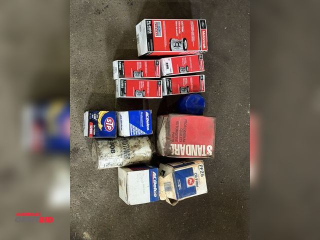Lot 1-1180 - Lot of assorted oil filters, (1) AC Delco, part #D1530F, light switch, and (1) Standard, part #DR450...