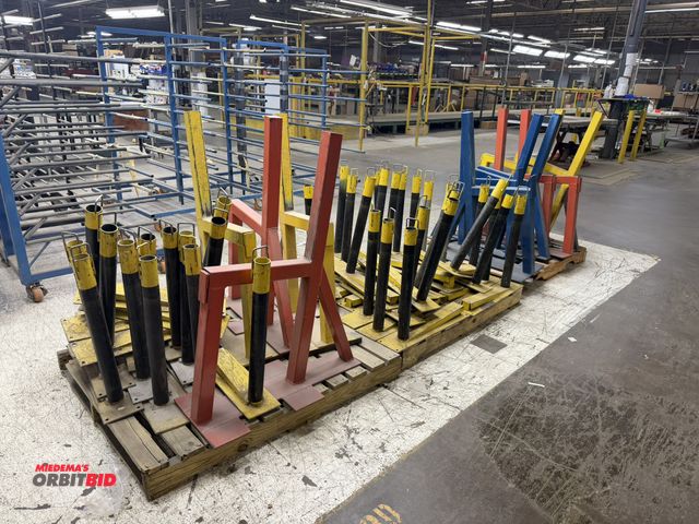 Lot 1-17451 - (3) skids of assorted portable safety rails, and 32" blue steel racks, winning bidder responsible fo...