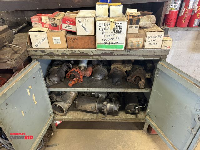 Lot 1-18528 - (1) Sheldon metal cabinet, 36" wide x 23.5" deep x 34" tall, with contents of assorted starters, wor...