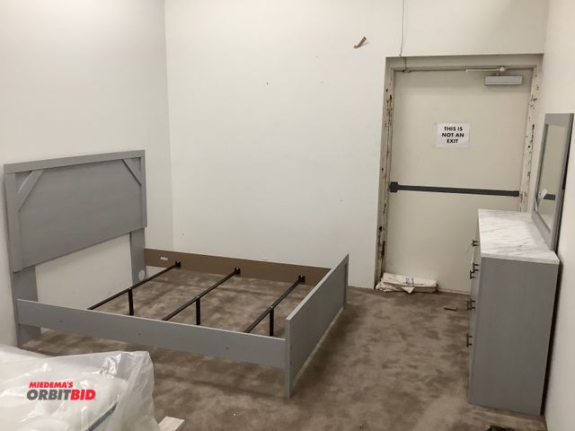 Lot 1-17232 - Queen size bed frame and matching dresser with attached mirror. Frame measures 82” by 63 1/2” in tot...