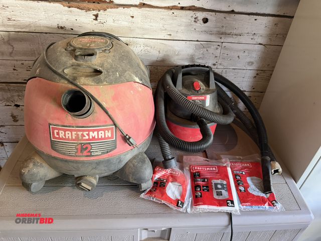 Lot 1-8370 - Lot including (1) Craftsman 12-gallon wet/dry vac with rotolock hose fitting (does not include hoses...