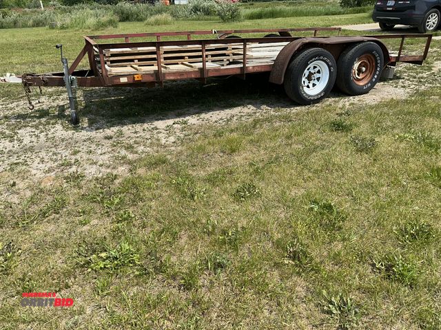 Lot 1-17850 - (1) custom fabricated 16' long dual axle, steel framed trailer with wood decking (decking needs repa...