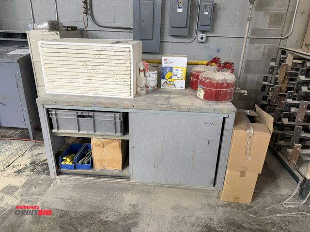 Lot 1-16467 - (1) steel, 2-door cabinet, 60" x 28", includes (2) gas cans, ear plugs, (2) boxes of sanding sponges...