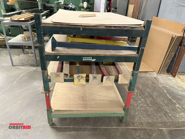 Lot 1-16318 - Lot of (4) 48" x 35.5" x 9" tall steel stackable racks with assorted sized stacking arms.