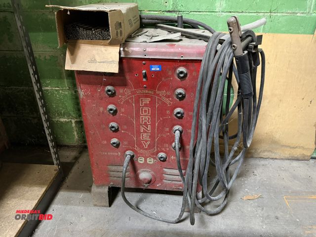Lot 1-18641 - (1) Forney stick welder, includes partial box of welding electrodes, includes welding rod gun, winni...