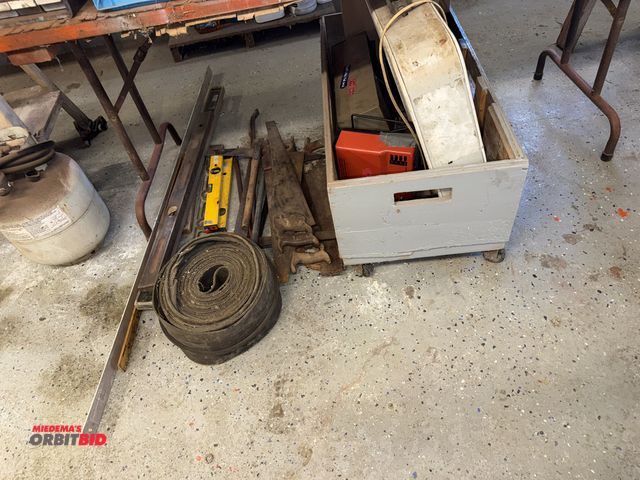 Lot 1-12127 - Large lot of assorted hand saws, levels, fan, heaters, and more.