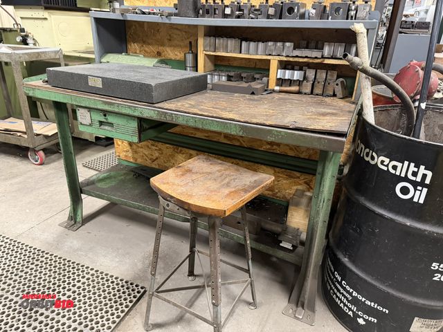 Lot 1-2011 - (1) 60" width x 34" height x 29" depth steel work bench with single drawer, lower shelf, and wood to...