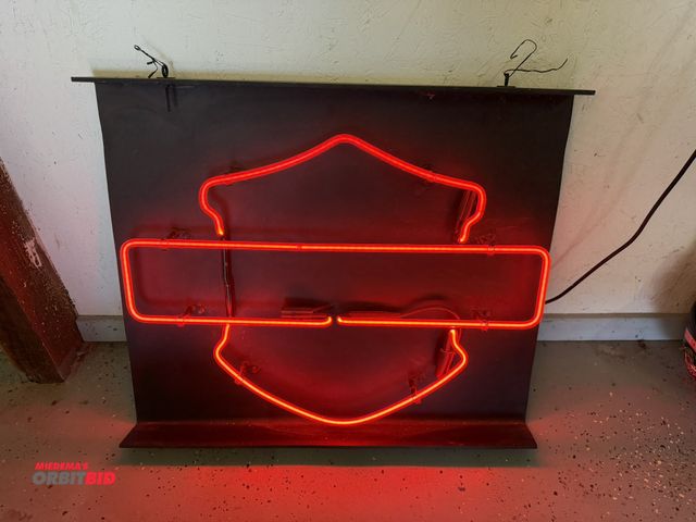 Lot 1-8242 - (1) approx. 27" wide x 20" tall Harley Davidson logo neon sign with resin backing.