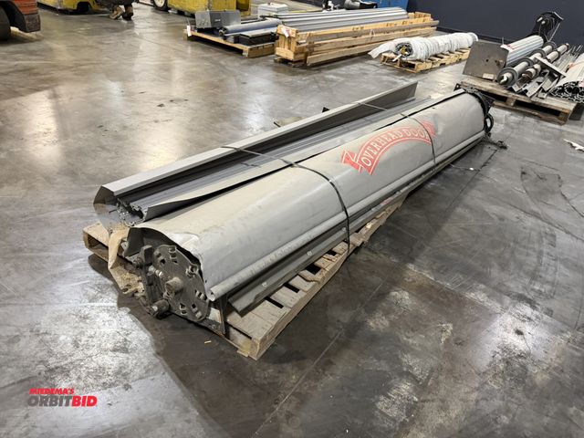 Lot 1-5660 - (1) Overhead Rollup Garage Door, appears to include some frame, S/N 113560301, approx. 124", manual ...