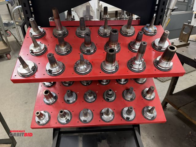 Lot 1-1940 - Lot of (36) Cat 50 shrink fit tool holders (rack not included).