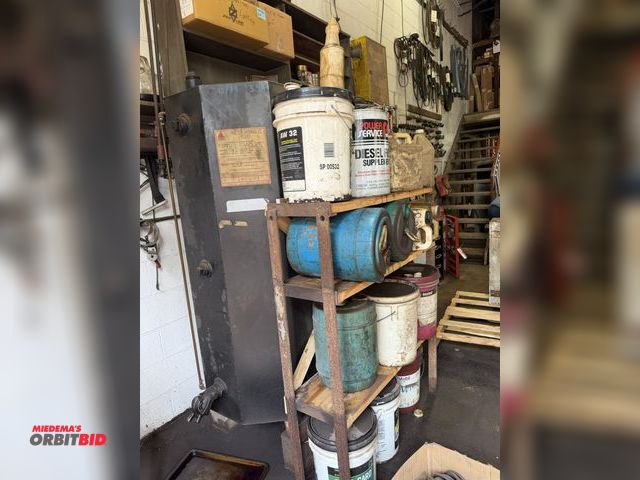 Lot 1-18592 - (1) approx. 250-gallon hydraulic oil tank, holding approx. 50-gallons of oil, metal framed rack with...