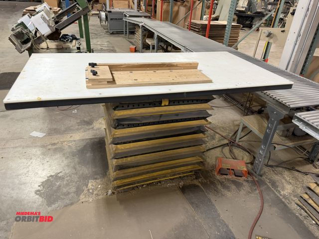 Lot 1-17508 - (1) electric over hydraulic lift table with custom poly top, 72" x 36", with foot pedal, in working ...