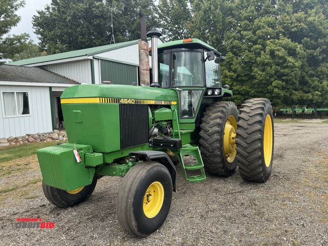 Lot 1-19951 - John Deere 4640 Tractor 2WD, 3 pt. with Quick Hitch, PTO shaft, cab with 2 remotes, (12) front weigh...