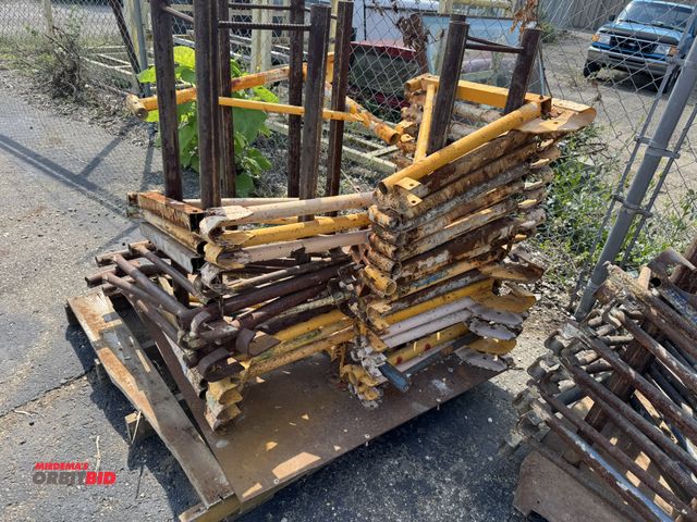 Lot 1-2657 - Lot of (25) saddle hangers, winning bidder responsible for proper removal.  (Greg)