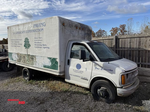Lot 1-15912 - 2001 Chevrolet 3500 (1) 14' box truck, 5.7 Vortec gas engine, rear roll up door, wood sides, wood sh...