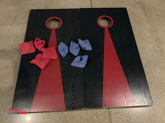 Lot 1-11197 - (2) 23-1/2" length x 47" height wood corn hole boards with (4) blue and (4) red bean bags