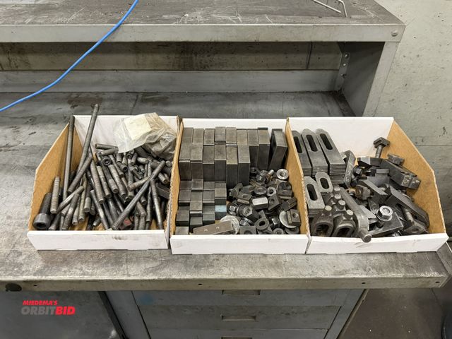 Lot 1-15414 - Large lot of assorted work hold tooling.