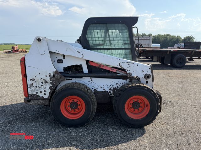 Lot 1-9885 - Bobcat S630 Rubber Tire Skid Steer ,AUX hydraulics, hydraulic quick attach, Cab, missing left side, ...