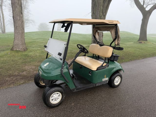 Lot 1-19333 - (1) 2015 E-Z-Go golf cart with a Kawasaki gas engine, includes canopy, ball cover, club cover, fold-...