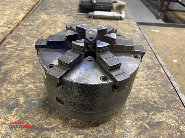 Lot 1-19454 - Lot of (1) Buck Chuck 8 1/4" diameter 6-jaw chuck with face mill plate.