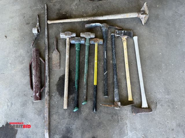 Lot 1-14152 - Lot including (3) approx. 12 lb., and (1) 8 lb. sledgehammer, (1) splitting wedge, (2) pick axes, (1...