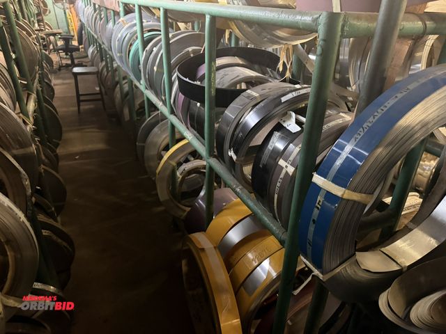 Lot 1-18781 - (1) 8' length x 59" height x 16" depth, 3-tier tube steel rack with assorted painted aluminum rolls,...