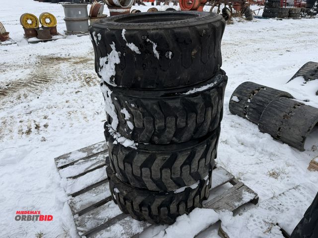 Lot 1-11687 - Lot of (4) used 10-16.5 skid steer tires, assorted brands.