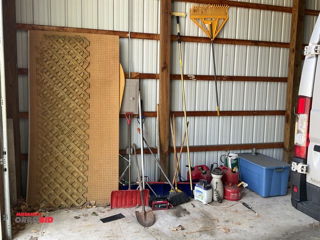 Lot 1-12005 - lot of assorted lawn tools, including snow shovels, spade shovels, pitchforks brooms, sprayers, 5 ga...