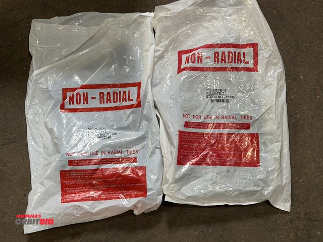 Lot 1-1202 - (2) size 650/750-15 non-radial inner tubes.