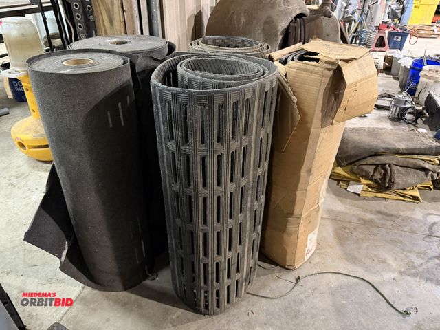 Lot 1-1549 - Lot including (2) approx. 36" wide x 12' long, and (1) 36" x approx. 8' long rubber mat, and (2) rol...