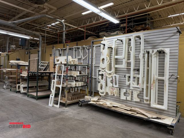 Lot 1-16331 - Lot of (11) 48" x 35.5" x 9" tall steel stackable stands, and (1) slat board wall, and (1) approx. 1...