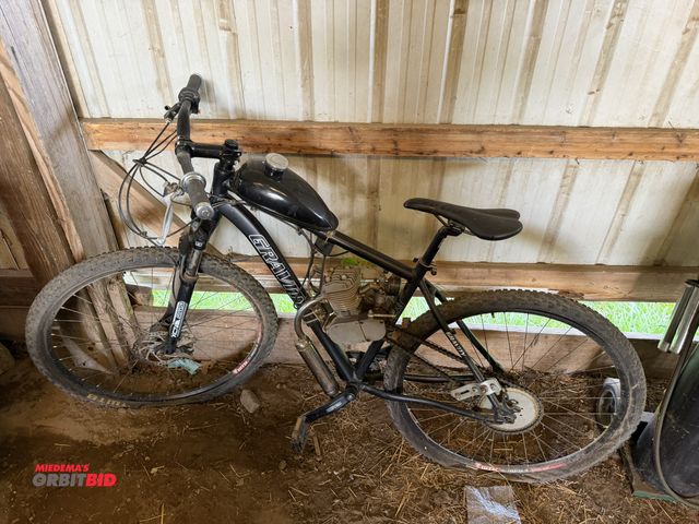 Lot 1-8503 - (1) Gravity gas powered bicycle, model G29, single cylinder gas engine, condition is unknown.