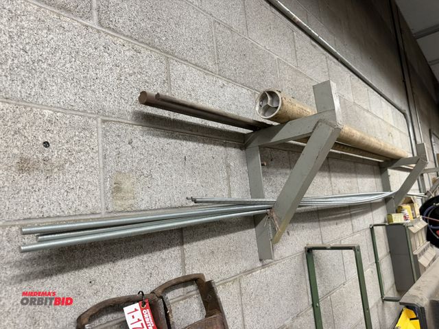 Lot 1-17123 - Lot of assorted threaded rod, includes (4) pieces, approx. 12' x 1/2", 1 1/4" steel rod, and more.