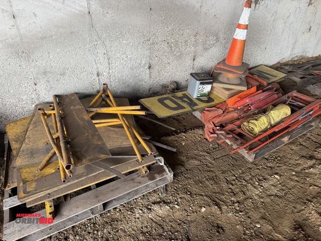 Lot 1-18285 - (2) skids of assorted Truck Oversize load banners/flags, Men Working safety signs, traffic cones, bu...