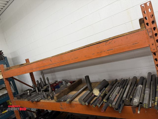 Lot 1-10367 - Entire content of tool steel and other items shown on shelf in photo, does not include racking or an...