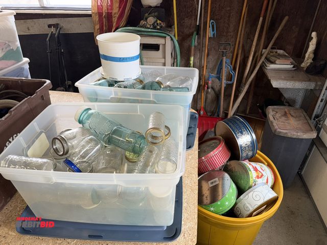 Lot 1-12123 - Large lot of assorted Mason jars, includes blue jars and some lids, various sizes.