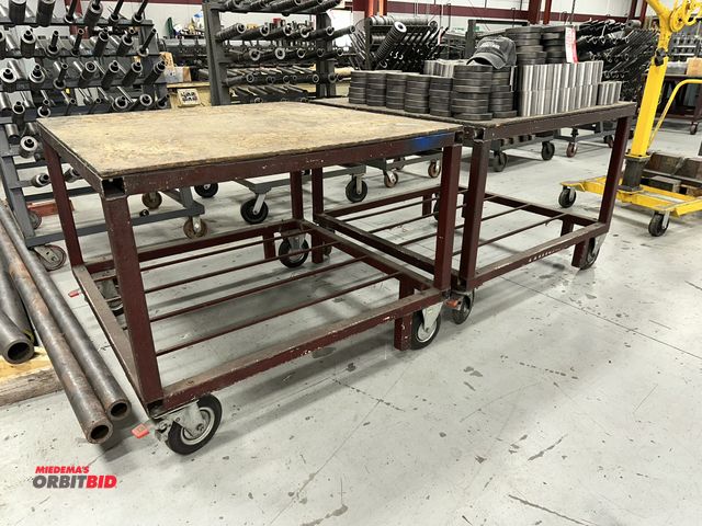 Lot 1-19228 - Lot of (2) 48" width x 37" height x 48" depth steel framed carts with OSB tops, and approx. 8" diame...
