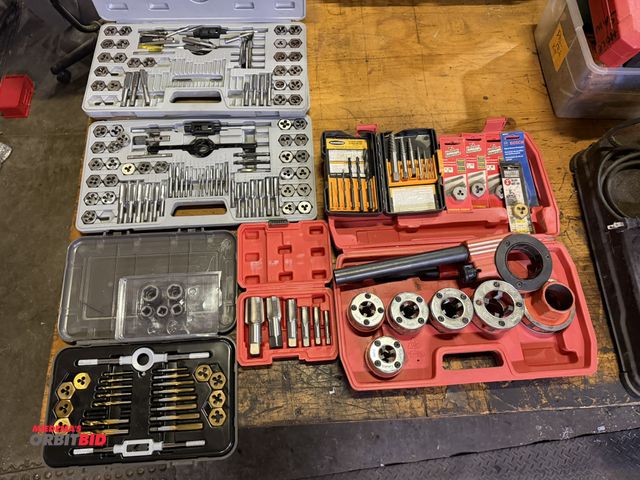 Lot 1-18524 - Lot including (3) tap and die kits (all are incomplete), assorted larger taps, and (1) pipe threadin...