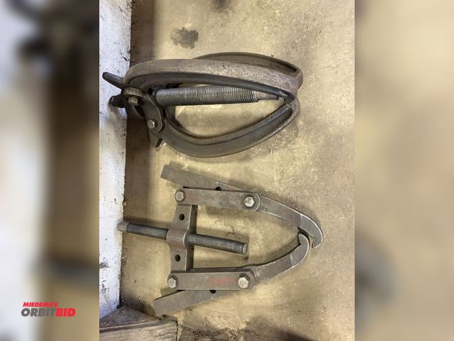 Lot 1-18525 - Lot of (2) large pulley pullers, (1) 3-hook pulley puller, approx. 15" long hooks, (1) 2-hook, appro...