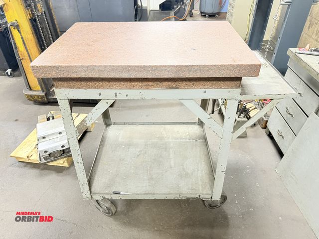 Lot 1-12411 - (1) 36" x 7" x 24" step-type granite surface plate with a 33" length x 36" height x 27.5" depth heav...