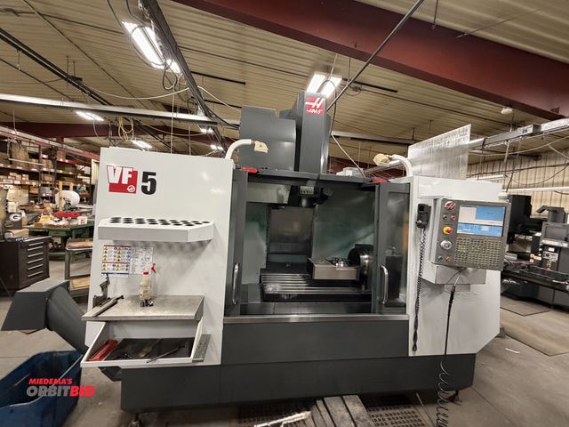 Lot 1-1642 - 2012 Haas VF-5/40 CNC Vertical Machining Center 30-HP, 10000-RPM, 23" x 52" T-Slot Table, Cat 40 40-...