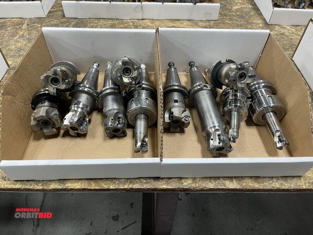 Lot 1-19371 - Lot of 11 Cat 40 tool holders, includes (8) face mills, and (3) indexable boring bars.