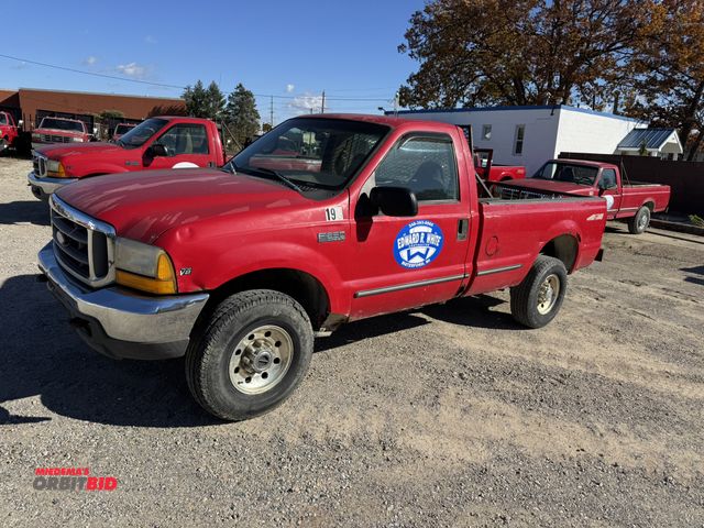 Lot 1-18252 - 1999 Ford F250 Super Duty Regular Cab Pickup Truck 4x4 8' bed, power windows and locks, automatic tr...