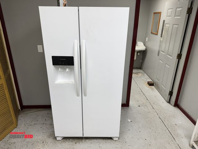 Lot 1-19570 - (1) Frigidaire, model FRSS2623AW0, side-by-side refrigerator/freezer, with ice and water dispenser, ...