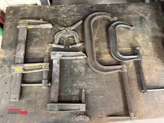 Lot 1-2049 - Lot including (1) 12", and (1) 18" F-clamp, (1) 6", (1) 10" C-clamp, and pair of adjustable welding ...