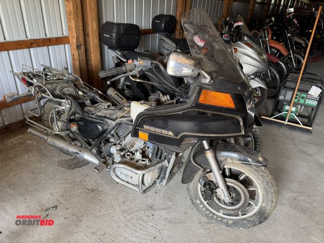 Lot 1-6494 - 1984 Honda Gold Wing 1200 (1) motorcycle, for parts or repair, missing bags, tank, seat, motor parts...