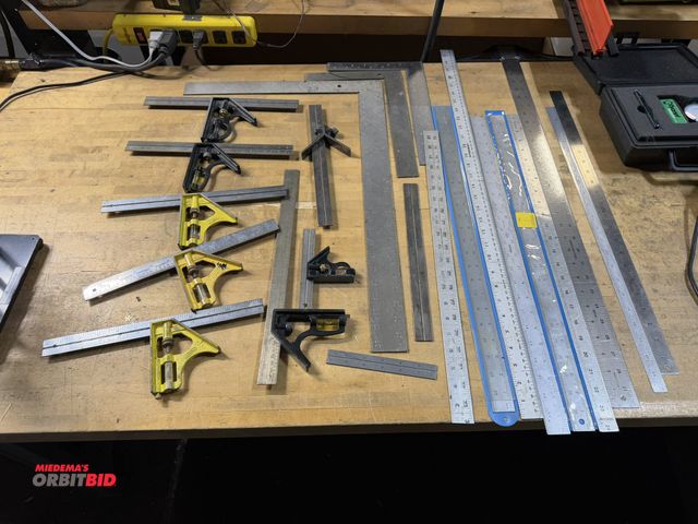 Lot 1-18838 - Large lot of combination squares, right angles, straight edge rulers, and more.