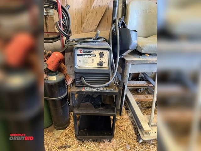 Lot 1-8513 - (1) Campbell-Hausfeld 115V MIG/Flux welder, 30 to 100 amp output, with cart and helmet.