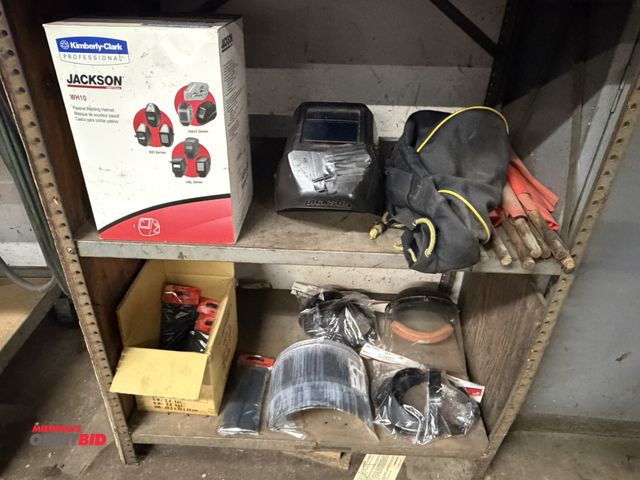 Lot 1-6454 - Entire contents of items shown on 2 shelves of rack, includes various face shield replacement head p...
