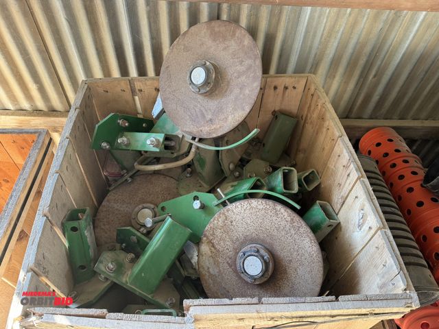 Lot 1-18101 - Lot of (16) John Deere fertilizer discs.